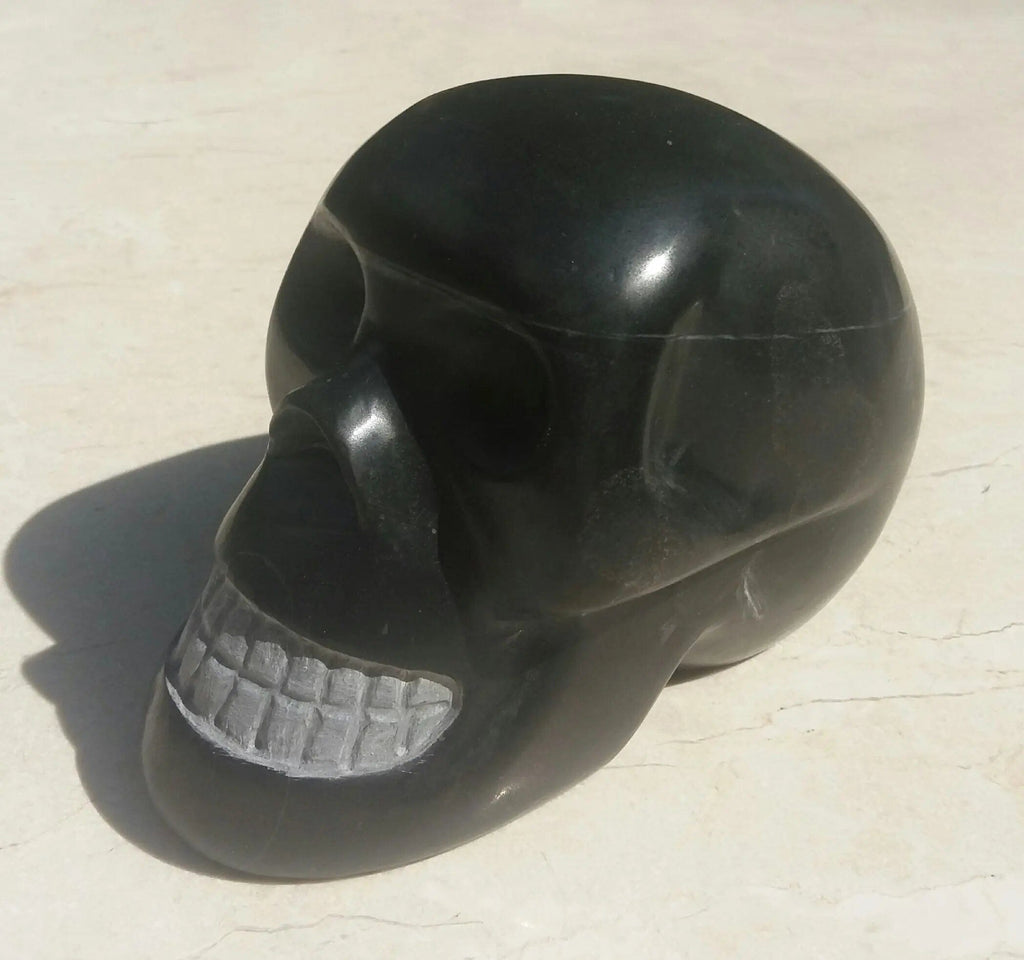 Sculpture « Crâne » en Marbre noir Marquina sculpture Nos Colonnes - Boutique Maçonnique 